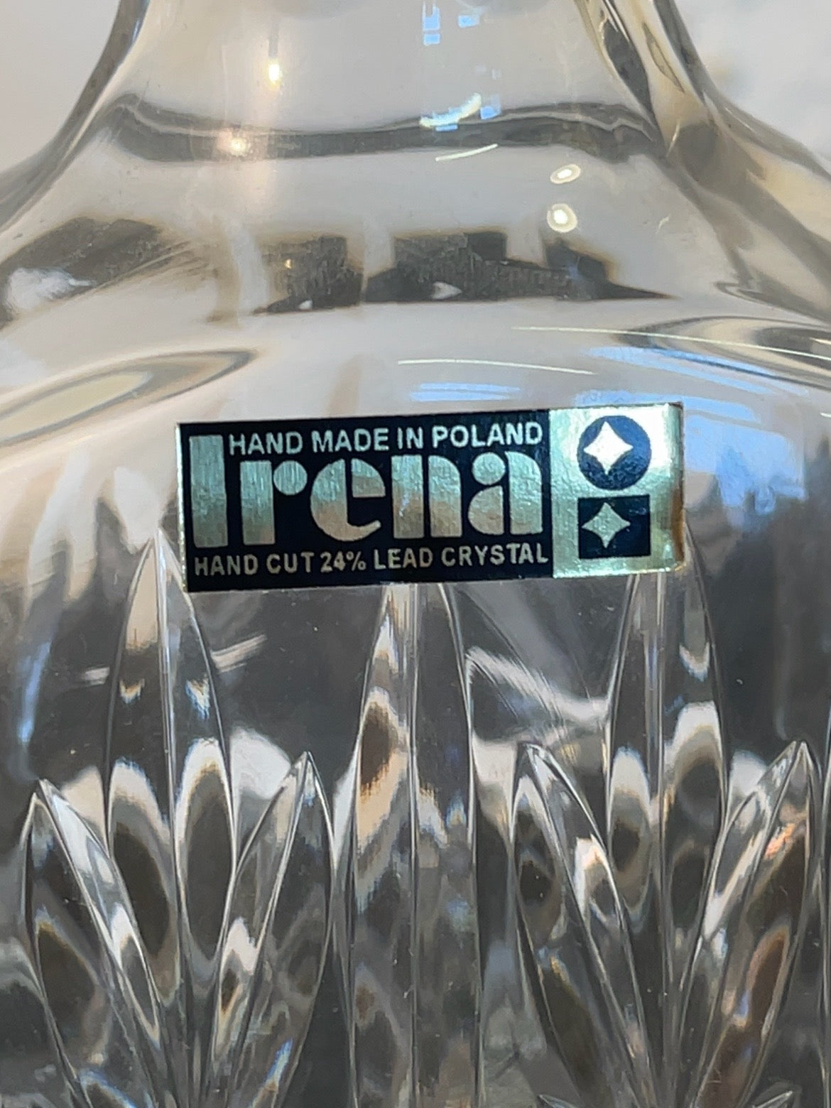 Close-up of the Irena Hand Made in Poland lead crystal label
