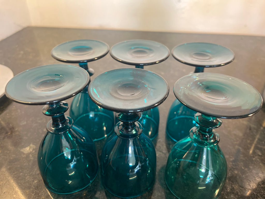 Bases of the six peacock-blue glasses