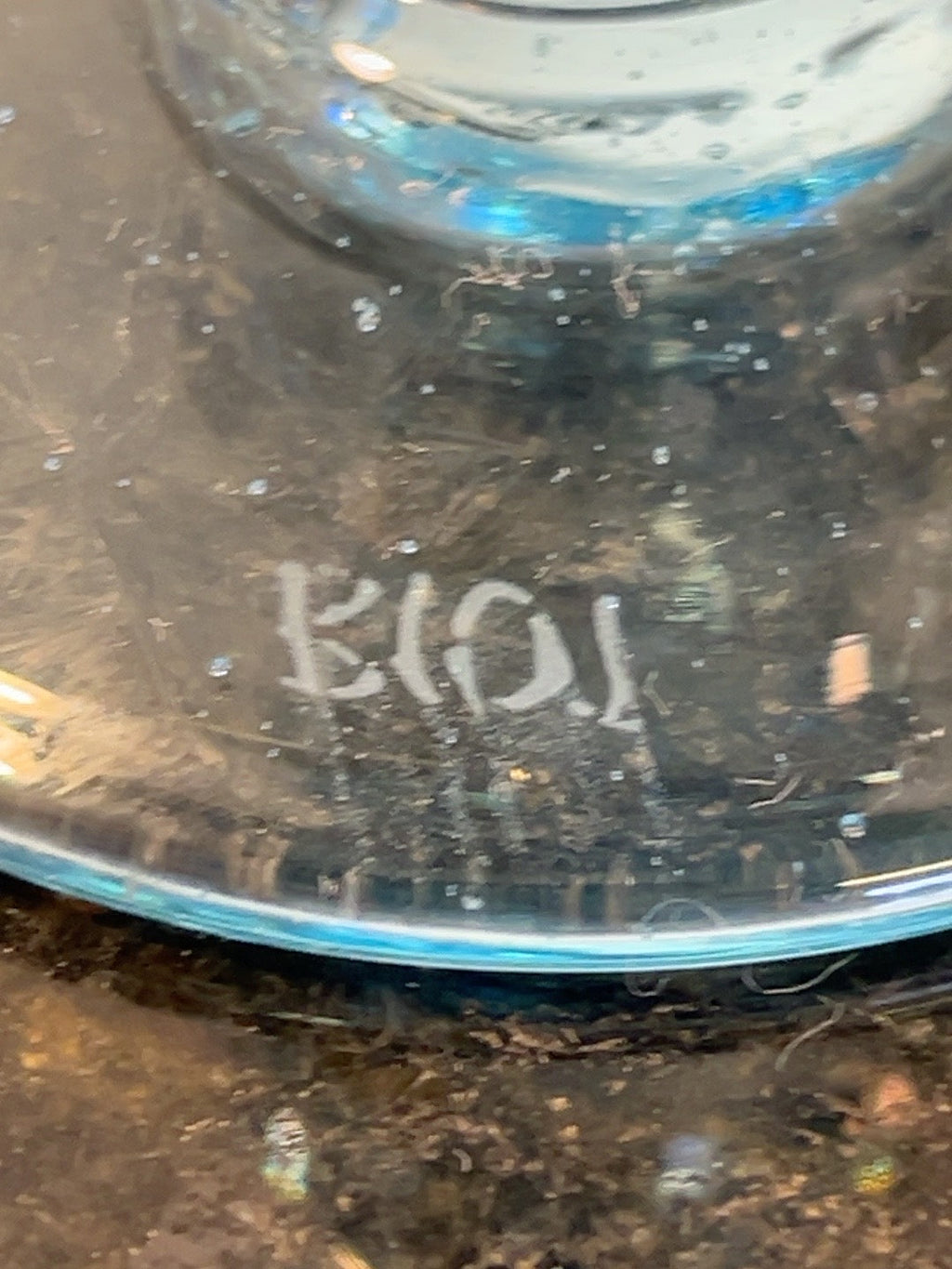 Engraved BIOT maker signature on glass candlestick base