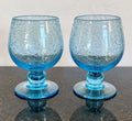 Pair of Biot France blue bubble gin goblets, full front view