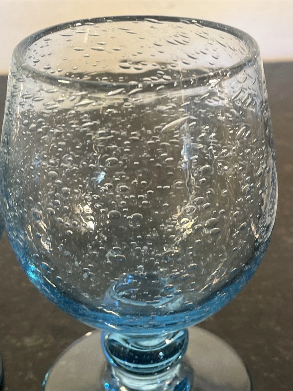 Close detail of the hand-blown bubble texture and bowl
