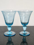 Pair of Biot France blue bubble wine goblets, full front view
