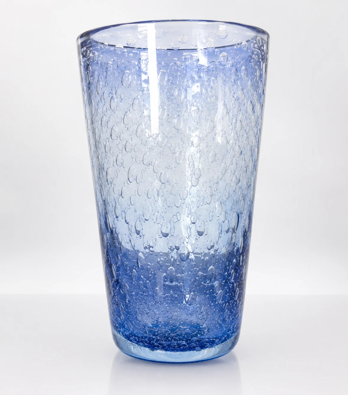 Full view of the blue bullicante style hand blown glass vase