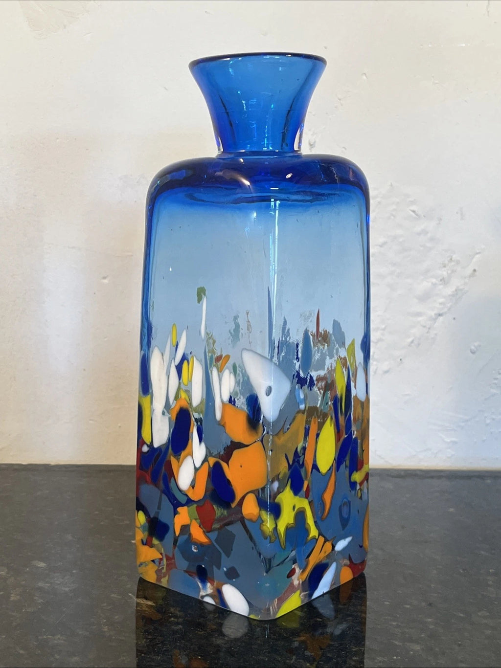 Full view of the blue square hand blown glass vase with colourful confetti inclusions