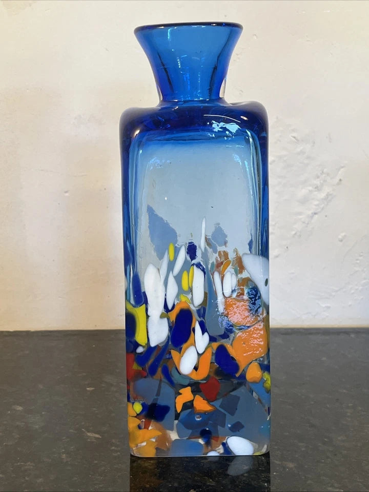 Second angle showing the rectangular cobalt rim and clear body