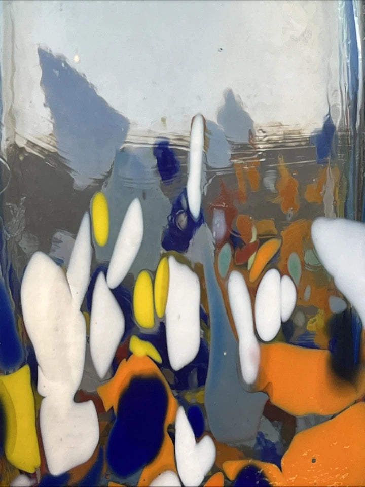 Side profile of the blue rimmed studio glass vase