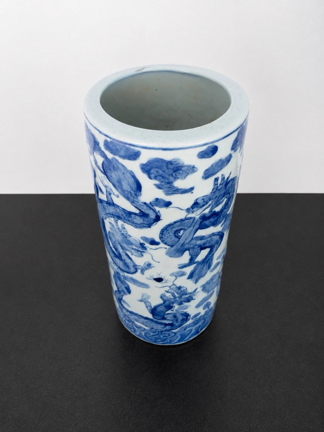 View into the rim and interior of the Chinese porcelain sleeve vase