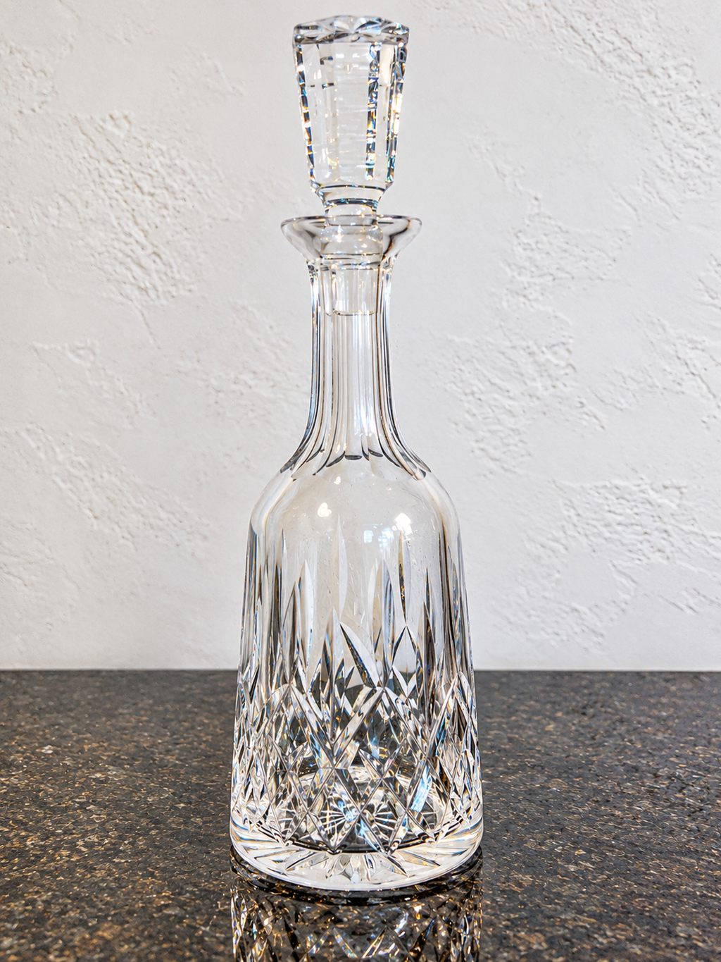 Waterford Lismore cut-crystal decanter on black marble, 33.5 cm