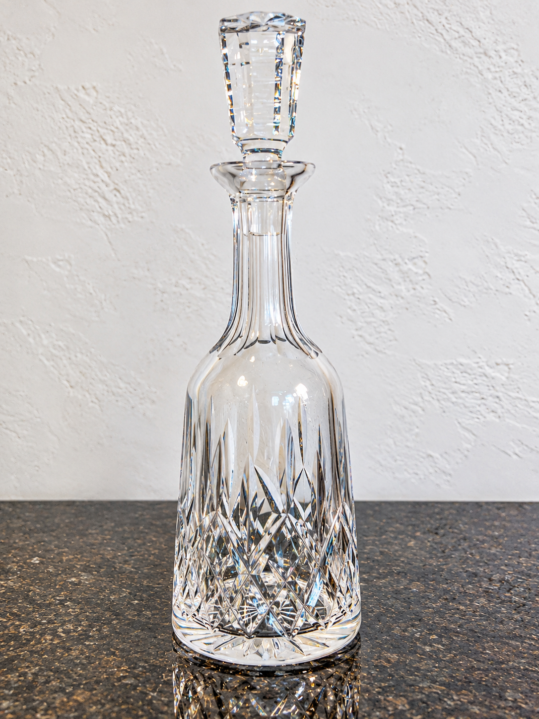 Waterford Lismore cut-crystal decanter on black marble, 33.5 cm
