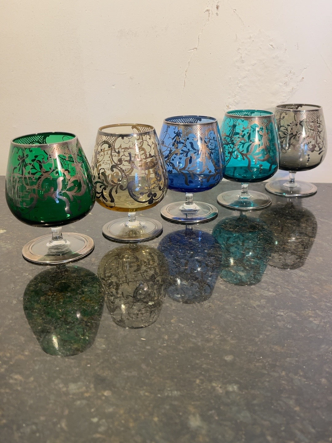 Five coloured Venetian-style floral overlay brandy glasses, original photograph
