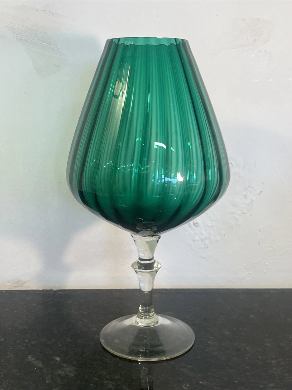 Full view of the emerald green ribbed Empoli-style art glass pedestal vase