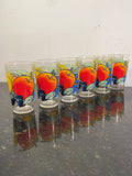Six colourful retro fruit-pattern tumblers with apple and grape decoration, original photograph