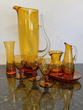 Full view of the Krosno amber art glass eight-piece set