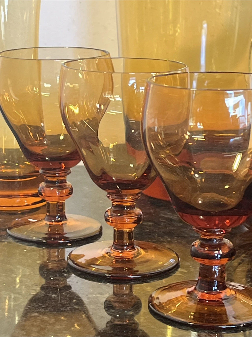Close view of the amber goblets in the Krosno glass set