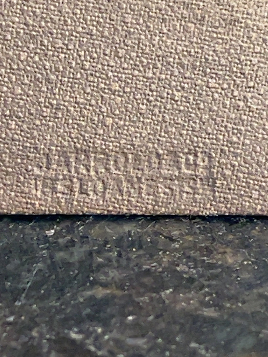 Detail of age wear on the portrait miniature backing