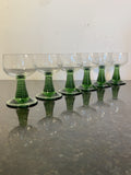 Original set of six Roemer green beehive stem hock glasses photographed on stone