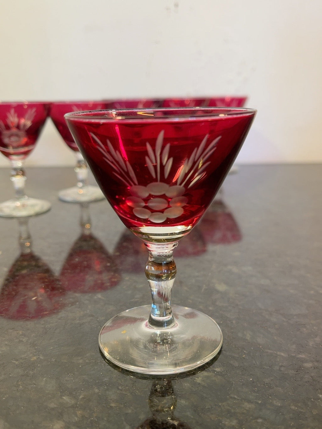 Detail of ruby red floral cocktail glass