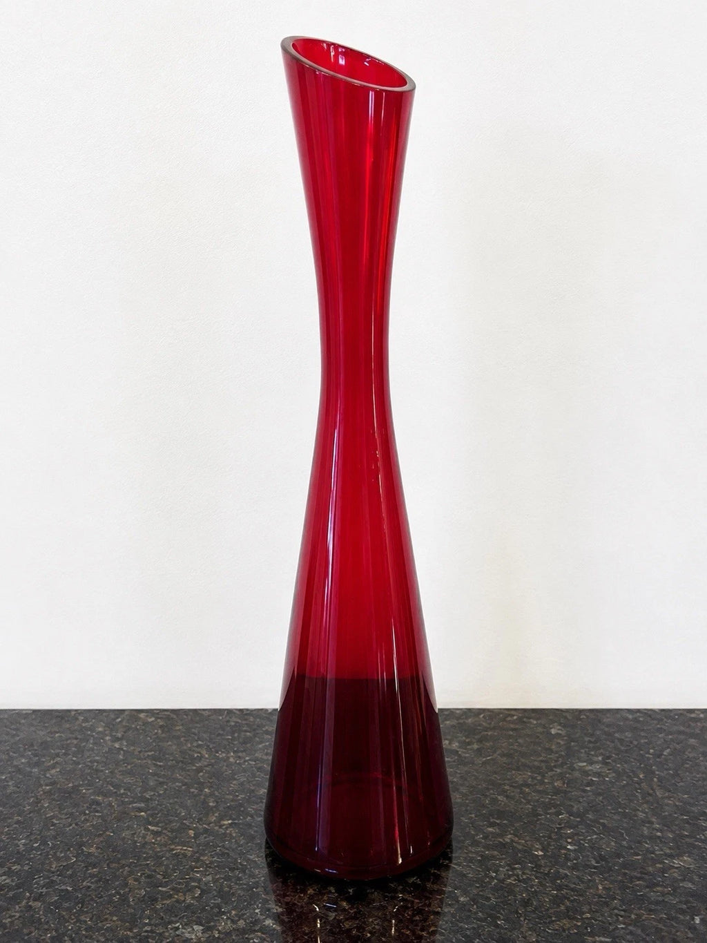 Full view of the tall signed ruby red art glass vase