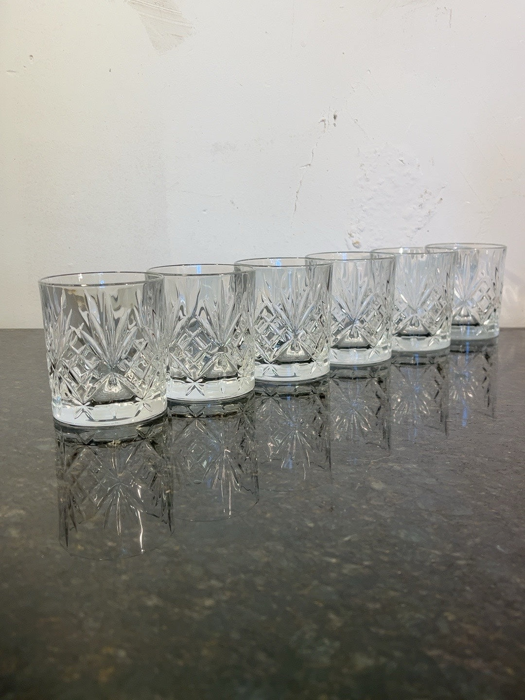 Six clear whisky tumblers with diamond lattice and fan pattern, original product photograph