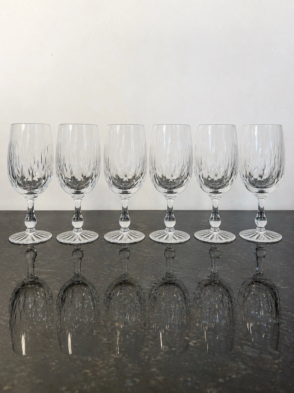 Six Webb Corbett Canterbury crystal water goblets shown together