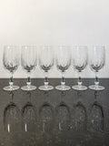Six Webb Corbett Canterbury crystal water goblets shown together
