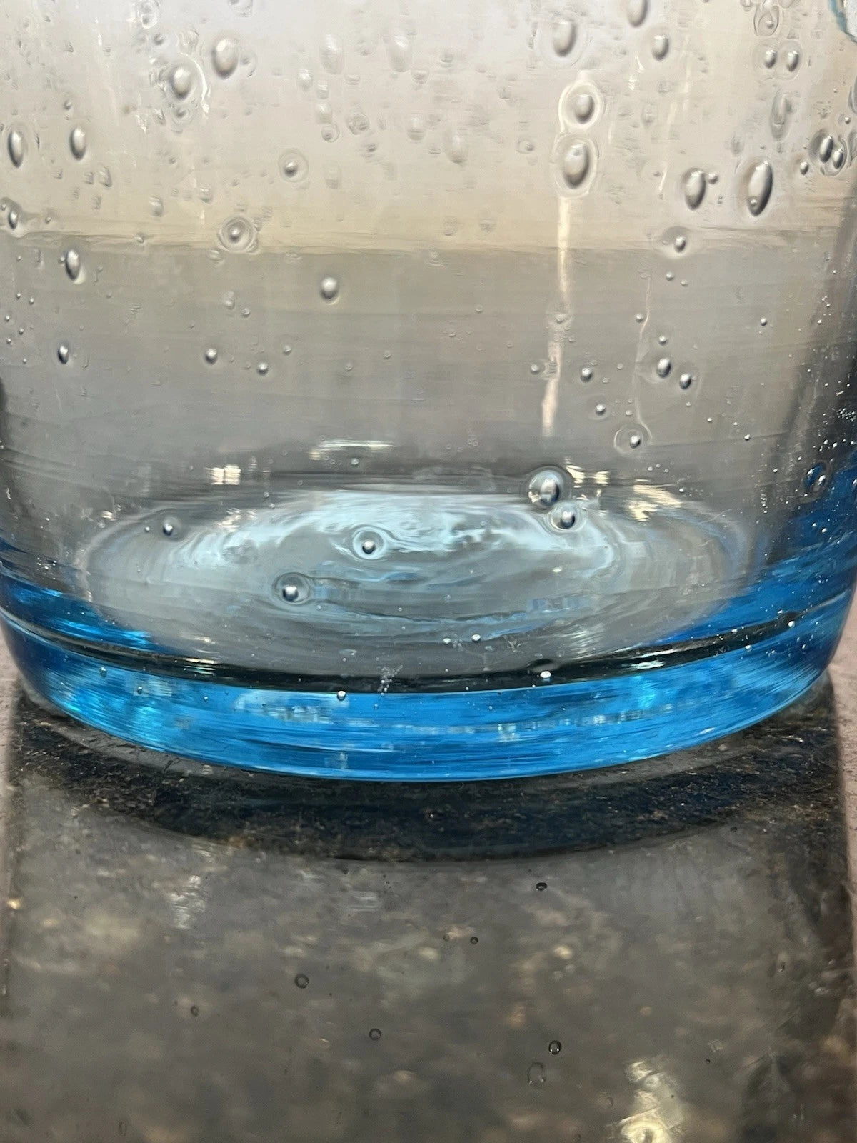 Close view of the thick blue base and bubble glass