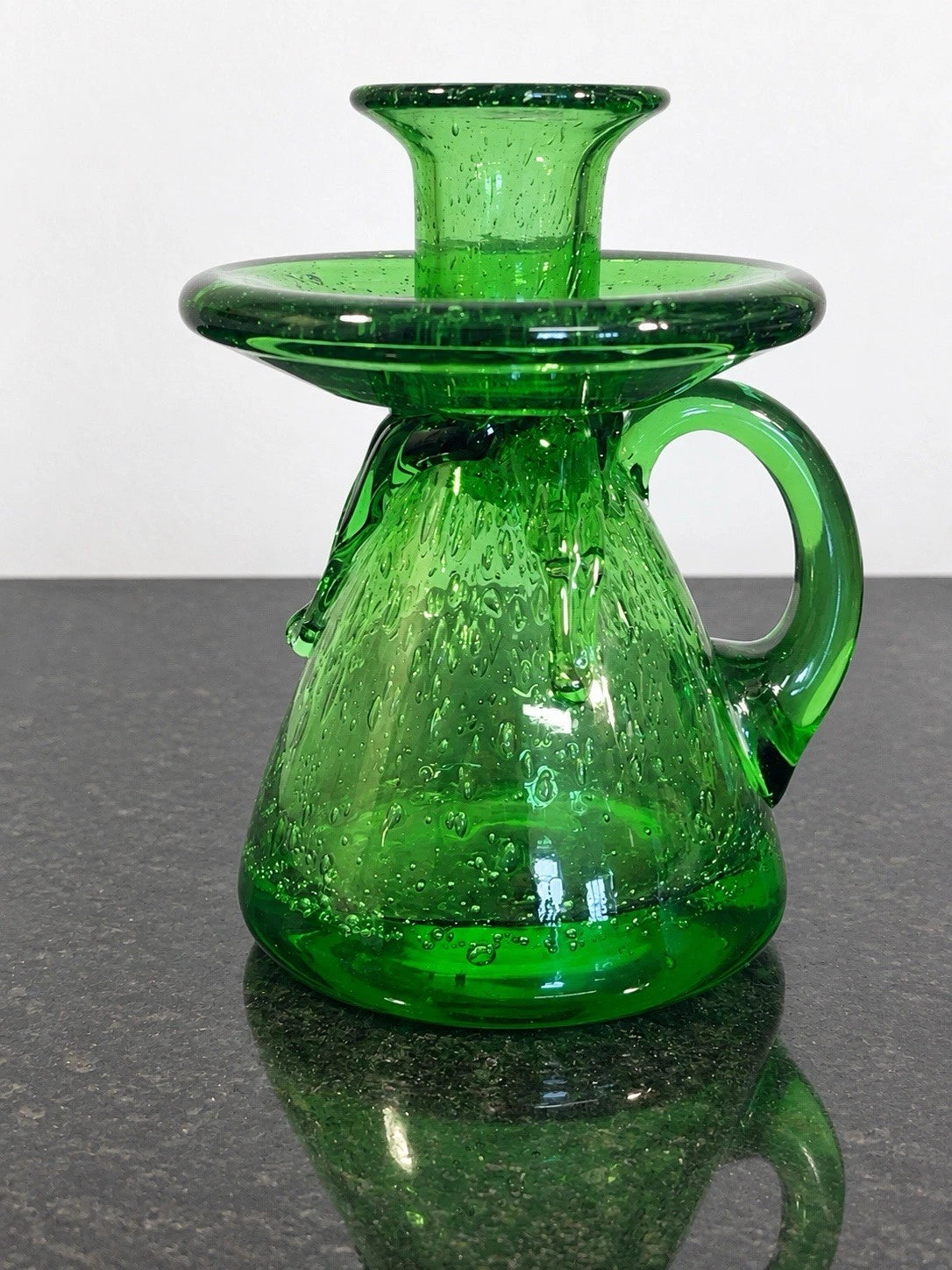 Full view of the green Biot bubble glass chamberstick candlestick