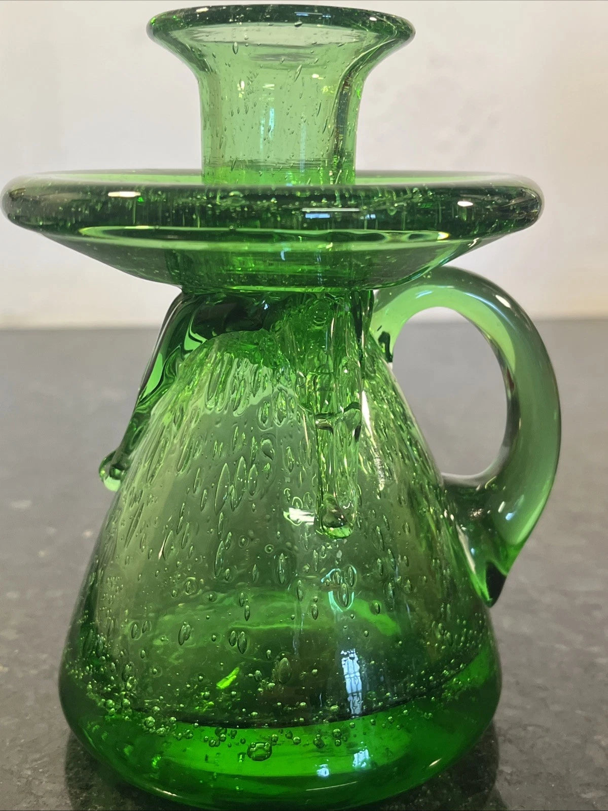Angled view of the Biot chamberstick and handle