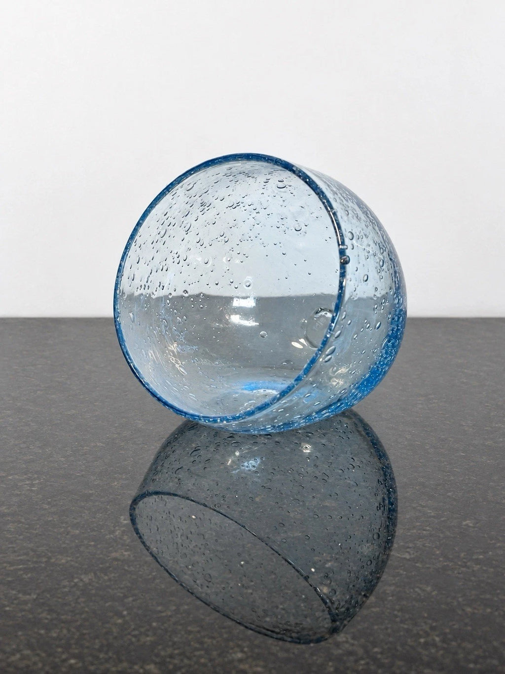 Blue Verrerie de Biot Coupe Gourmande bubble-glass bowl shown at an angle