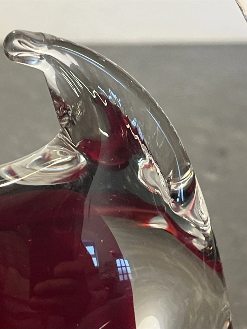 Ruby red cased glass fish, side detail