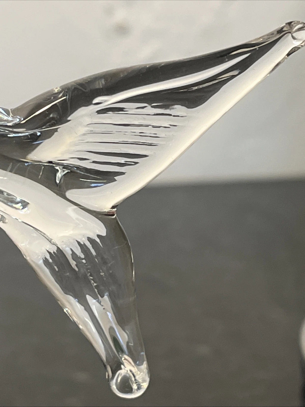 Vintage glass fish, base and foil label detail