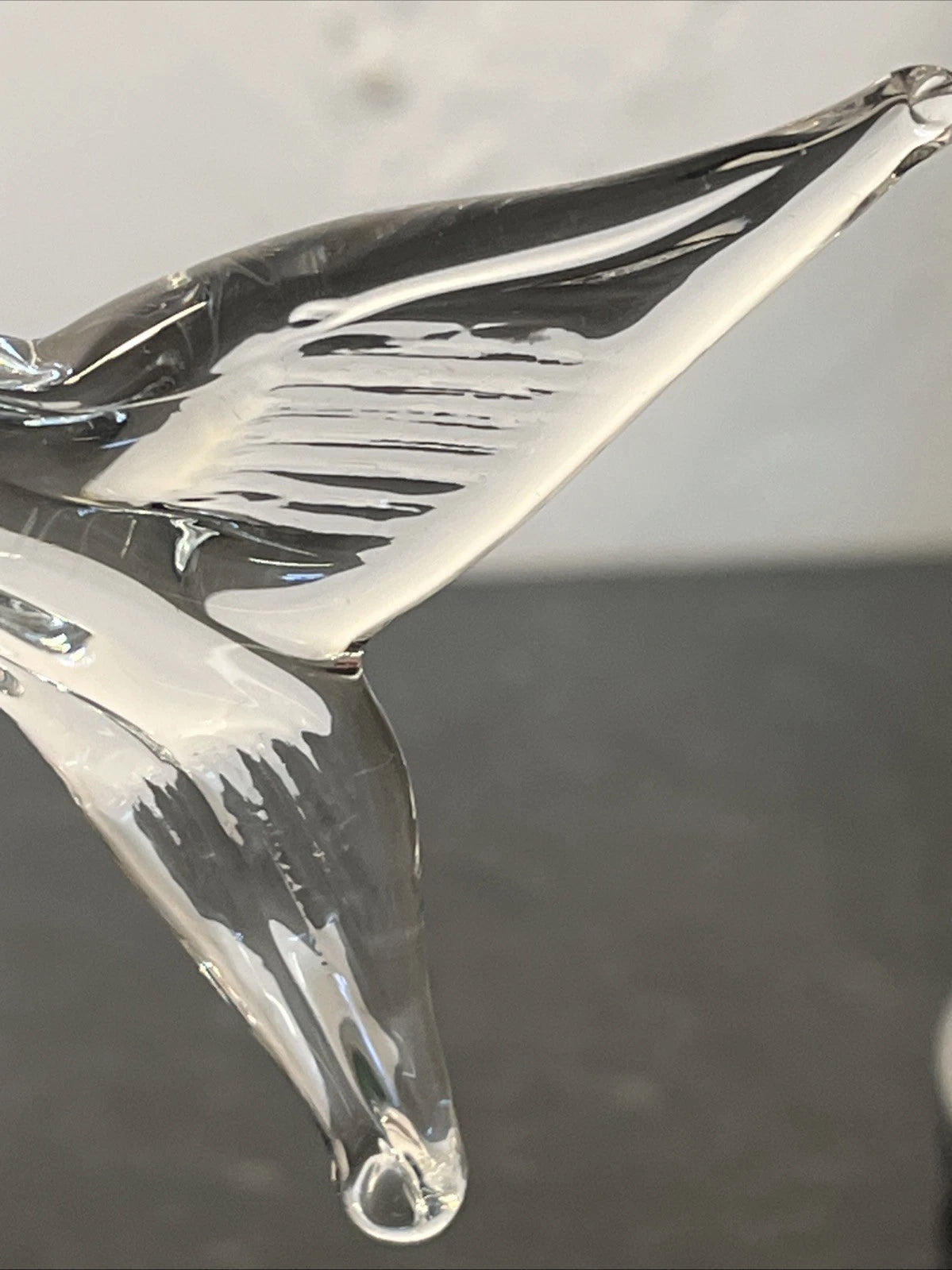 Vintage glass fish, base and foil label detail