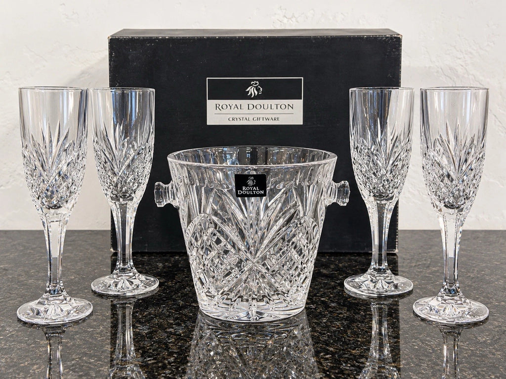 Royal Doulton crystal champagne set with four flutes and handled ice bucket