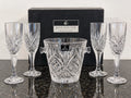 Royal Doulton crystal champagne set with four flutes and handled ice bucket