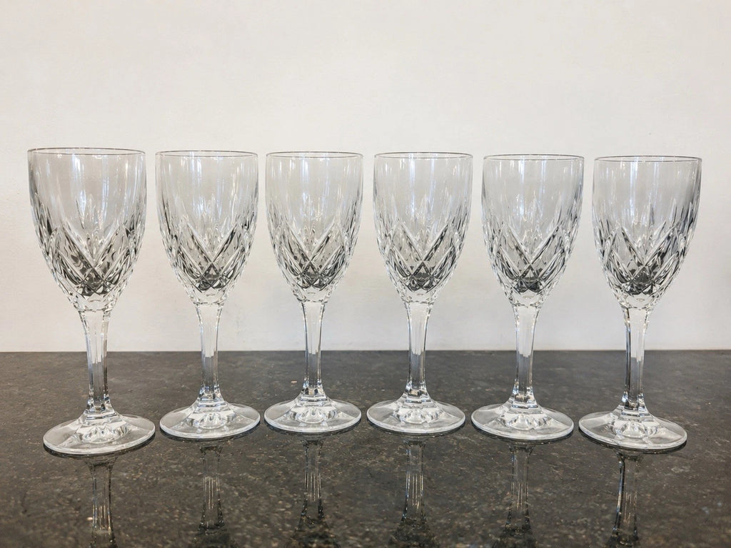 Six clear cut crystal wine goblets, full set