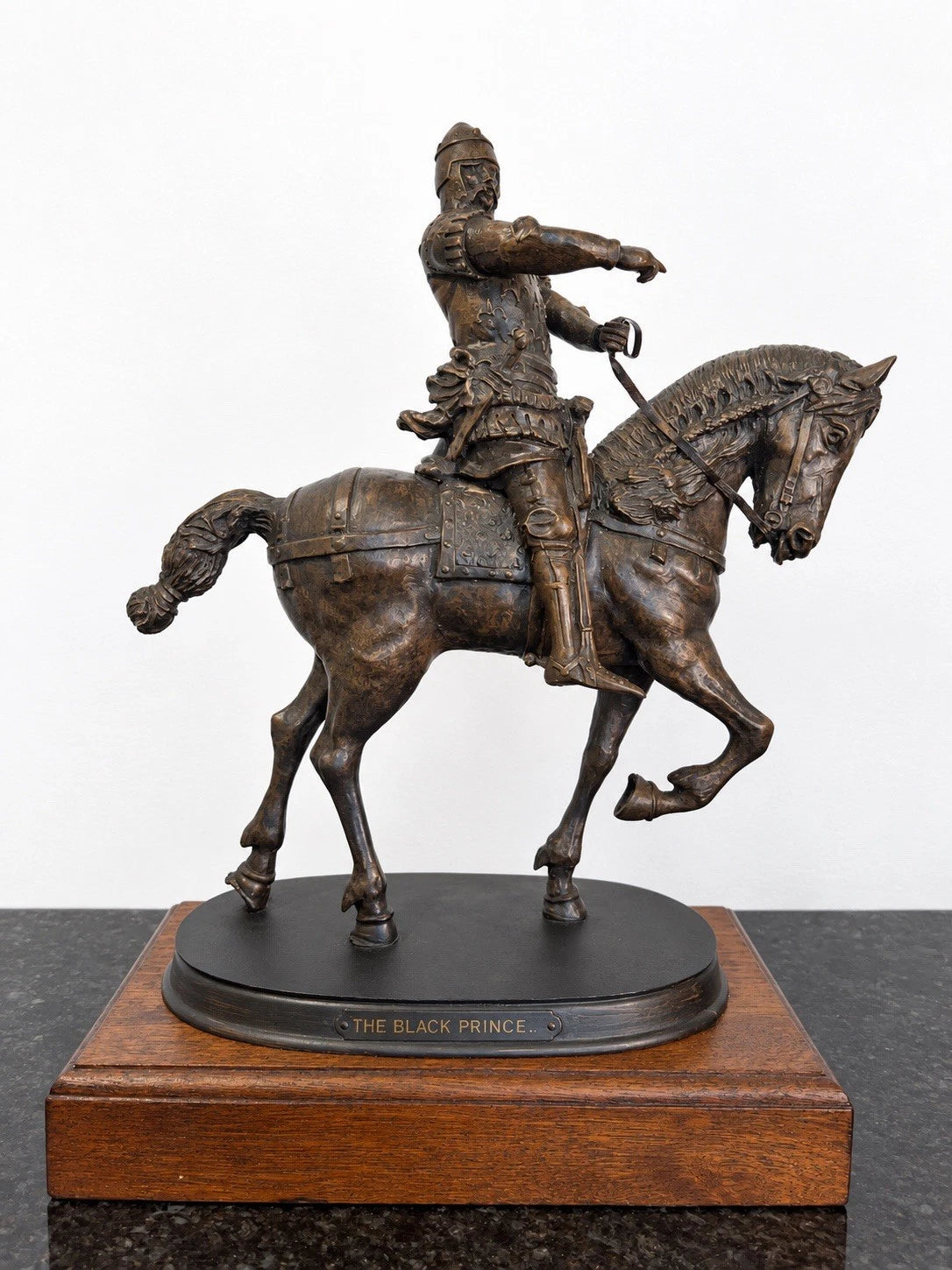 Black Prince medieval knight on horseback, full sculpture on plinth