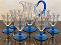 Blue art glass jug and five matching goblets, full set