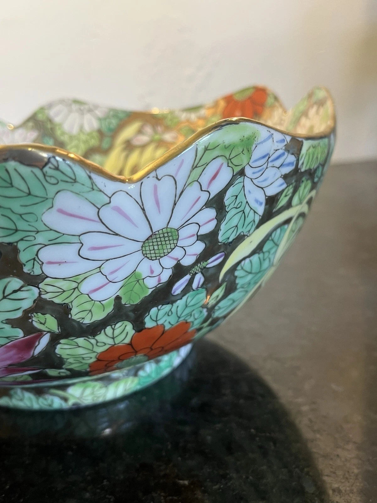Chinese famille noire bowl, side and scalloped rim detail