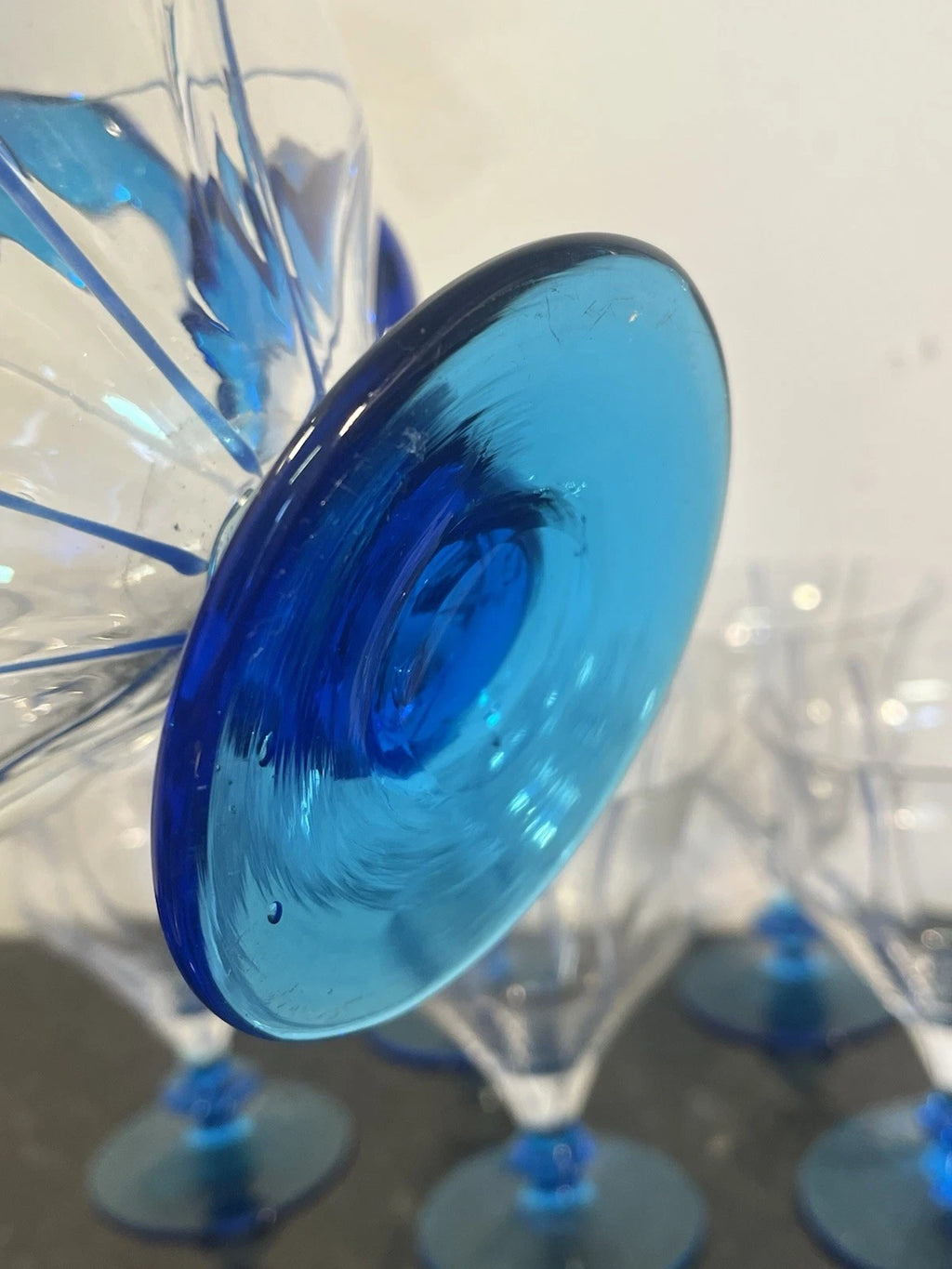 Detail photo of the blue art glass drinking set
