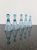 Full view of five Biot bubble glass liquor pomponnettes